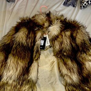 Faux Fur jacket from Fashion Nova. Never worn. Brand new with tags. Size Small